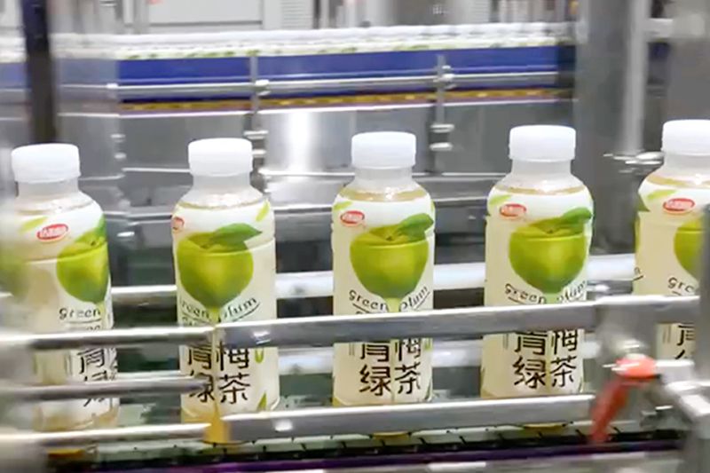 Green Tea Plastic Bottle Shrink Sleeve Labeling Solution for Dali Foods Group